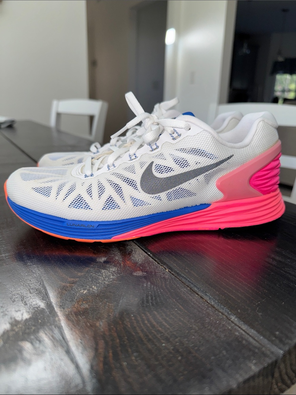 Nike Women’s White Running Shoes with Neon Pink & Blue Midsole